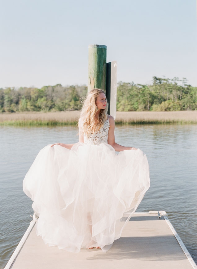 Blush by Hayley Paige’s “Halo” gown from Bridals by Jodi. Olivia Dar’s earrings from Celadon