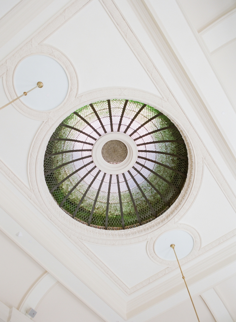 One of the most popular places to wed at the newly renovated Gibbes Museum of Art is the Campbell Rotunda Gallery, which is topped by this stained glass beauty. Part of the venue’s recent $13.5 million facelift included hand-washing each of the 4,680 glass panels. (Photo by Corbin Gurkin)