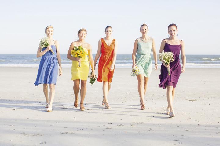 Colorful WOmen: Bridesmaids were assigned a color and picked their own dresses and accessories