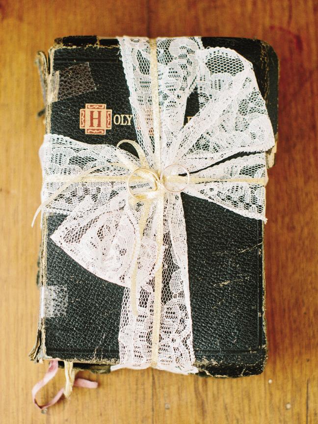 Jennifer bound her late grandfather’s Bible with a lace ribbon to hold the rings during the ceremony.