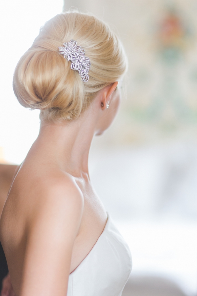 Bride&#039;s gown by Oscar de la Renta. Hair by Blushing Brides. Image by Elisabeth Millay Photography.