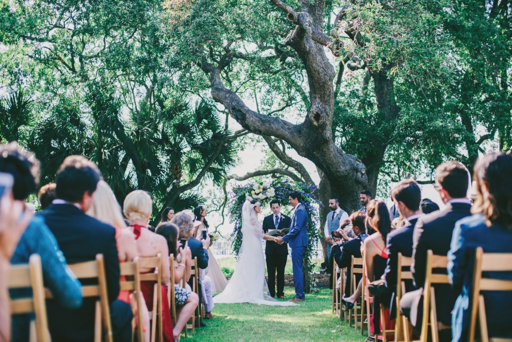 Photograph by Hyer Images at Lowndes Grove Plantation. Floral arch by Loluma.