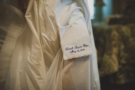 UNDER WHERE?: Sarah pinned a monogrammed handkerchief, the “something blue,” gifted by her mother-in-law, in the crinoline lining of her dress.