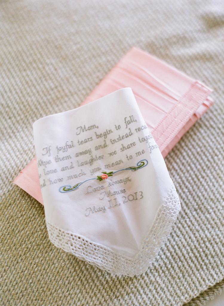 NEW-FOUND HEIRLOOM: Liz’s great-grandmother embroidered a handkerchief for Liz’s mom with a special message from the bride.