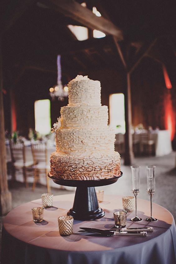 TASTE QUARTET: The cake, from Wedding Cakes by Jim Smeal, featured four flavors: red velvet, pistachio, blueberry buttercream, and pecan praline.