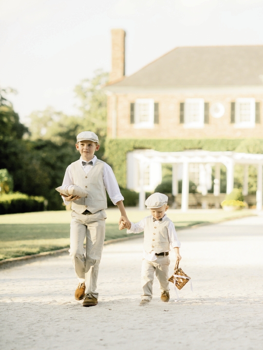 Ring bearers’ ensembles by Janie &amp; Jack. Image by Brandon Lata Photography at Boone Hall Plantation and Cotton Dock.