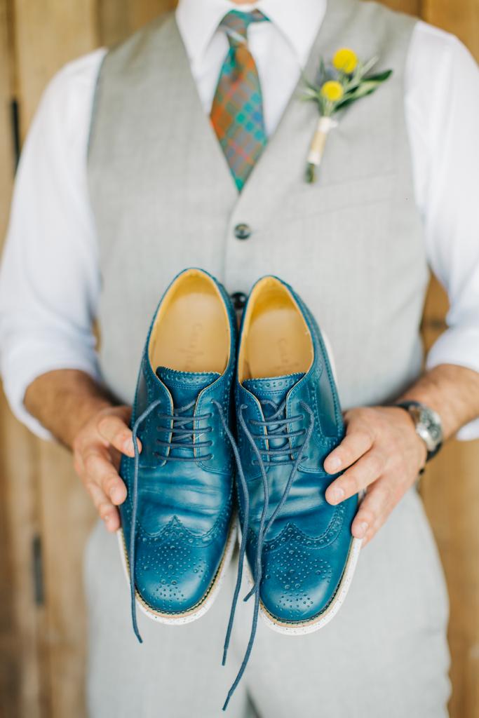 Be Colorful: The groom’s blue leather brogues coordinated with his tie, which was made in his family’s tartan.