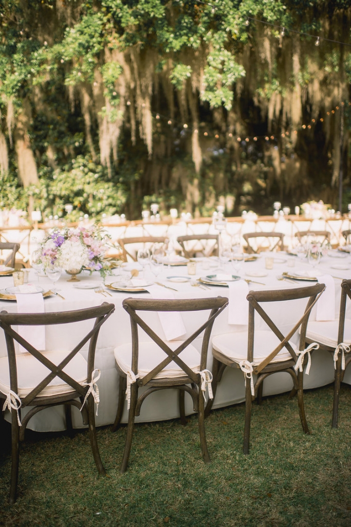 Wedding design by Sweetgrass Social Event + Design. Florals by Branch Design Studio. Rentals from EventWorks. Lighting by Technical Event Company. Image by Timwill Photography at the Legare Waring House.