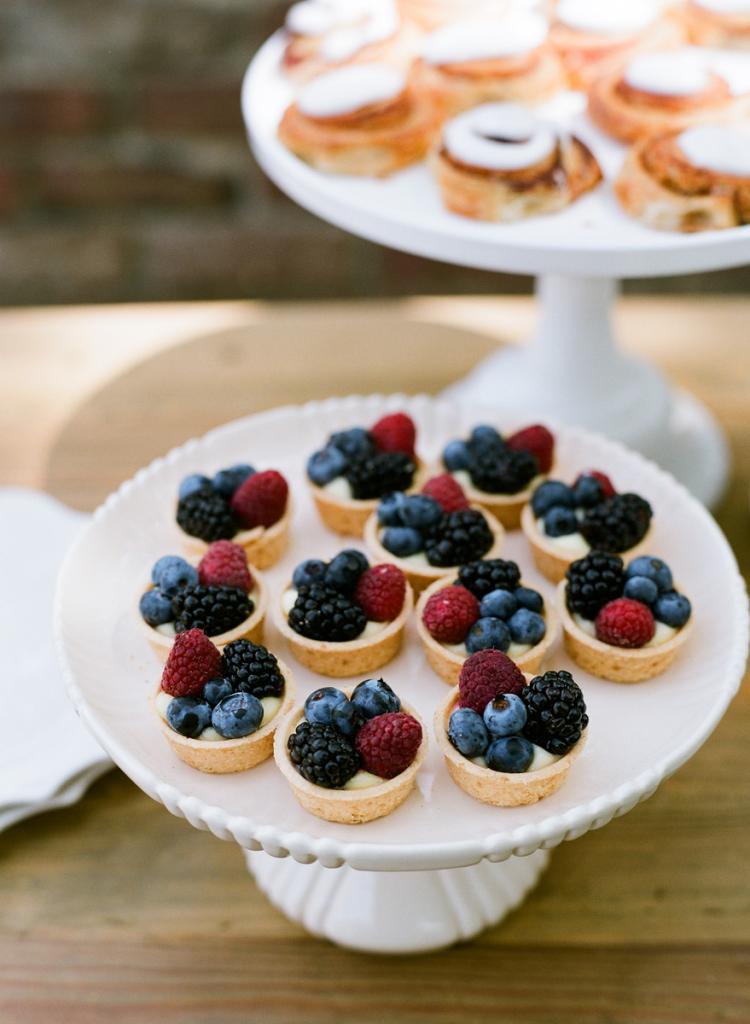 TAKE YOUR PICK: Liz’s teatime theme called for treats—like these mini custard and fruit tarts and cinnamon rolls—befitting of the time of day.