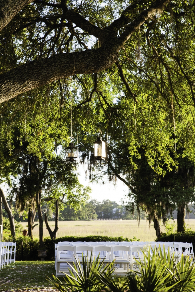 PLAIN PRETTY: The stunning setting suited pared-back decorations, like these simple hanging lanterns.