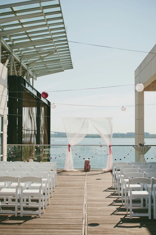 SUNDAY FUNDAY: Ruth and Thomas envisioned a small wedding by the water, and the rooftop deck of the South Carolina Aquarium was a perfect match. Choosing to have it on a Sunday morning, Ruth says, “made things a little bit cheaper.”