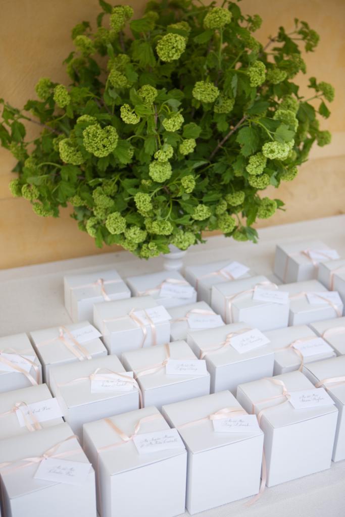 KEEPSAKE: The team at Kristin Newman Designs surprised the couple with favors of teacups and seed packets for each of their guests to take home.