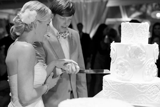 DIG IN! The all-white, three-tiered confection from Weddings Cakes by Jim Smeal was decorated with a trio of patterns pulled from the reception’s décor.