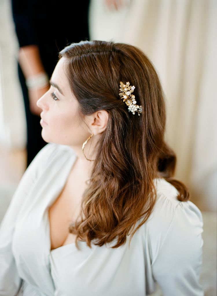Jessica Murnane in TwoBirds Party Collection’s  “Margaux” dress from Bella Bridesmaids. Emma Katzka’s “Rachel” hair comb from Lovely Bride. Gold Christina Jervey earrings from Gwynn’s of Mount  Pleasant.