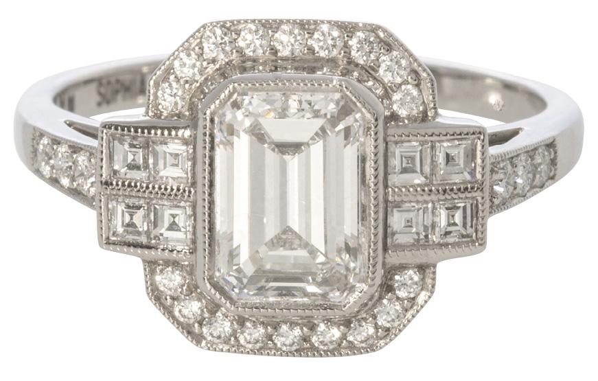 Emerald-cut center diamond (1.08 cts.) with diamond accents (.36 total cts.) set in platinum from Croghan’s Jewel Box ($15,000)