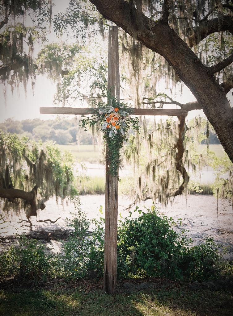 BONDED: A family friend made the wooden cross that marked the ceremony altar.