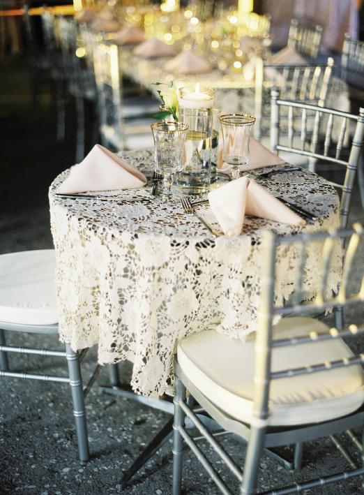 SWEETHEARTS: Mary Jo, Alex, and their daughter, Georgi, shared a table dressed with crocheted lace, pale pink napkins, and gold-rimmed tableware from Event DRS.