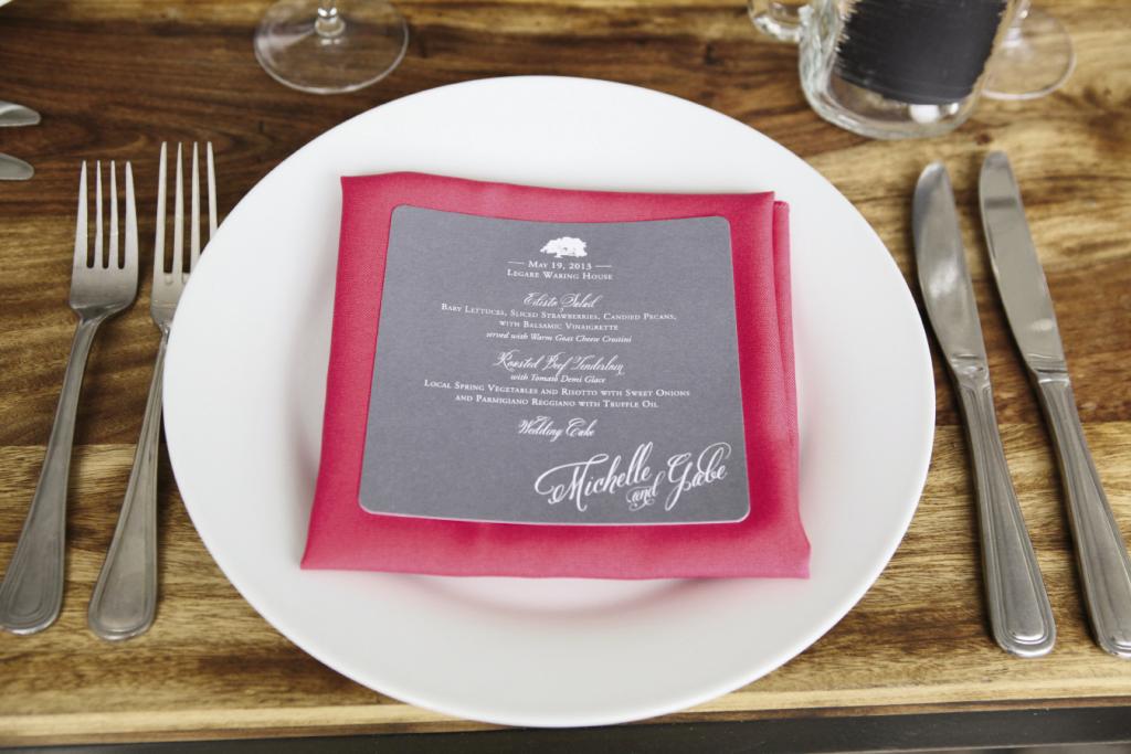 SHADES OF GREY: “Hot” pink linens were offset with cool tones, like graphite-colored menus.