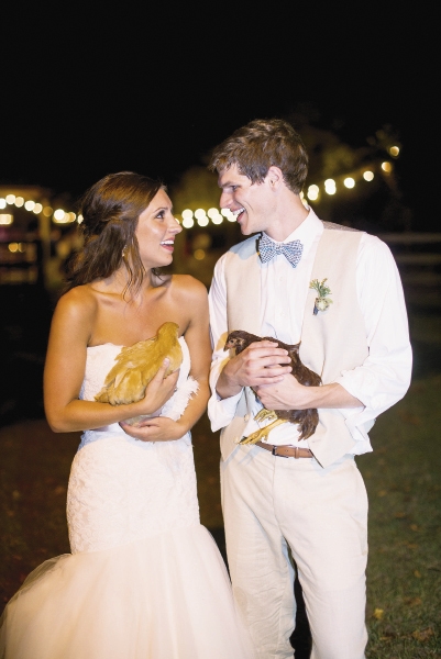 Bride&#039;s gown by Legends by Romona Keveza (available locally through Maddison Row). Groom&#039;s suit by Calvin Klein. Image by Timwill Photography at Hyde Park Farm &amp; Polo Club.