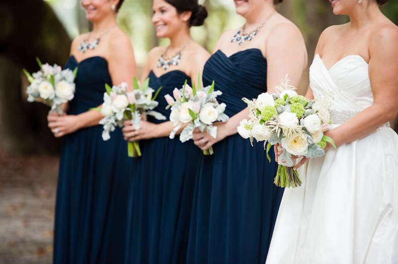 Bride’s attire by Romona Keveza. Bouquets by Branch Design Studio. Image by Hunter McRae Photography.