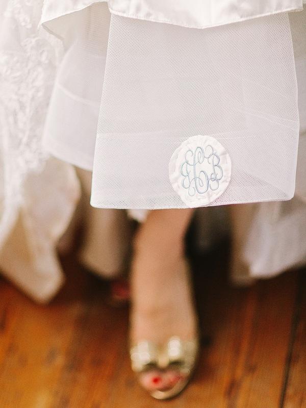 Bridal gown by Allure Bridals, available in Charleston through Bridals by Jodi. Shoes by Kate Spade. Image by Amy Arrington Photography.