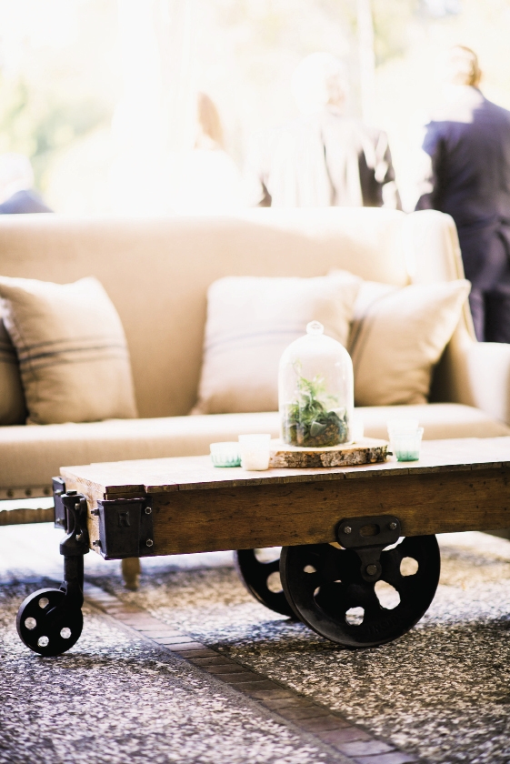 ALL THE TRIMMINGS: Katie Poole of Tusk Events helped the couple handpick antique furnishings from Ooh! Events, like this trolley table. “The décor felt easy, eclectic, and personal to Lindsay and Brian,” says Katie. “Their event was a true labor of love.”