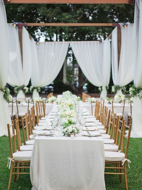 Wedding design and coordination by Easton Events. Structure and lighting by Technical Event Company. Rentals from Snyder Events. Florals and draping by Sara York Grimshaw Designs. Linens from La Tavola. Image by Virgil Bunao Photography at Lowndes Grove Plantation.