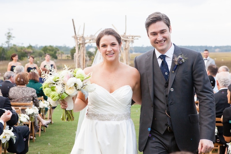 Bride’s attire by Romona Keveza. Groom’s attire by Rag &amp; Bone. Florals by Branch Design Studio. Image by Hunter McRae Photography.