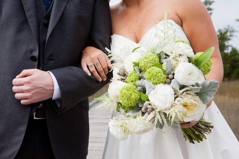 Bride’s attire by Romona Keveza. Groom’s attire by Rag &amp; Bone. Florals by Branch Design Studio. Image by Hunter McRae Photography.