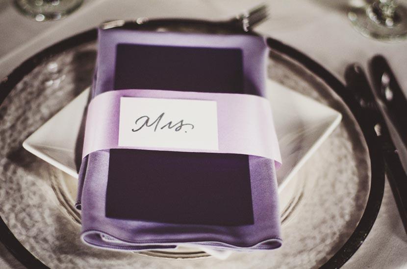 THIS SEAT’S TAKEN: Satin ribbon in lilac added sheen and tone-on-tone depth to the napkins.
