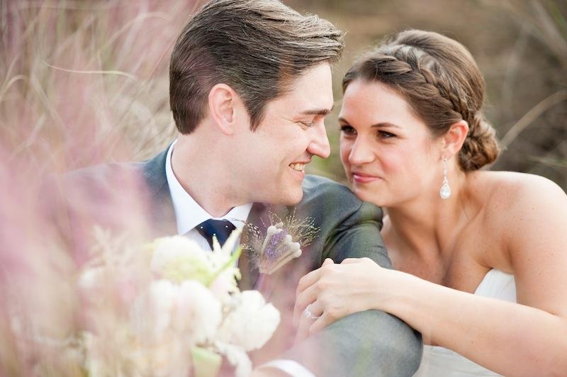 Bride’s attire by Romona Keveza. Groom’s attire by Rag &amp; Bone. Image by Hunter McRae Photography at the Daniel Island Club.