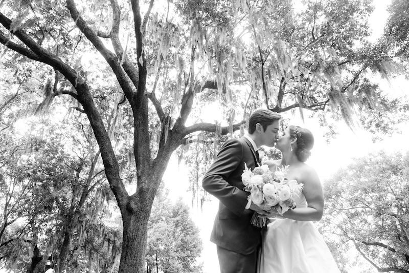 Bride’s attire by Romona Keveza. Groom’s attire by Rag &amp; Bone. Florals by Branch Design Studio. Image by Hunter McRae Photography at the Daniel Island Club.