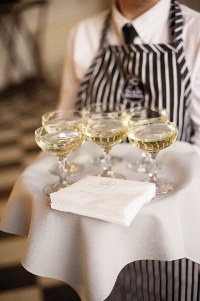 CHEERS! Guests toasted the newlyweds—and rang in the New Year—with champagne coupes, considered fashionable in the 1930s.