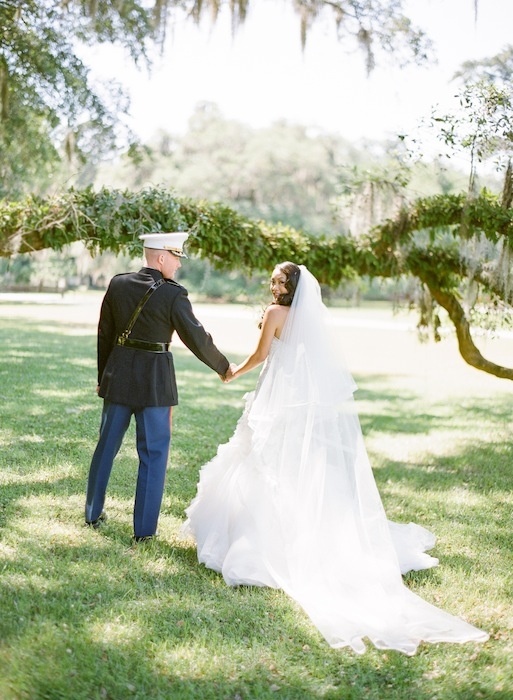 Gown by Mark Zunino. Veil by Pnina Tornai. Image by KT Merry Photography at Middleton Place.