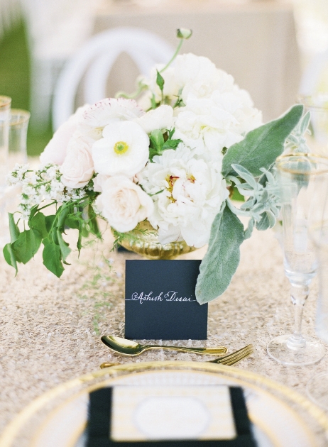 Florals by Charleston Stems. Linens from La Tavola. Place cards by Laura Hooper Calligraphy. Image by KT Merry Photography.