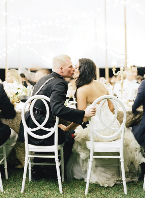 LOVE ETERNAL: The couple sat in EventHaus’ Infinity chairs placed at the center of a kings’ table alongside their parents, the wedding party, and more. They loved the party-watching vantage it afforded, says Kat.