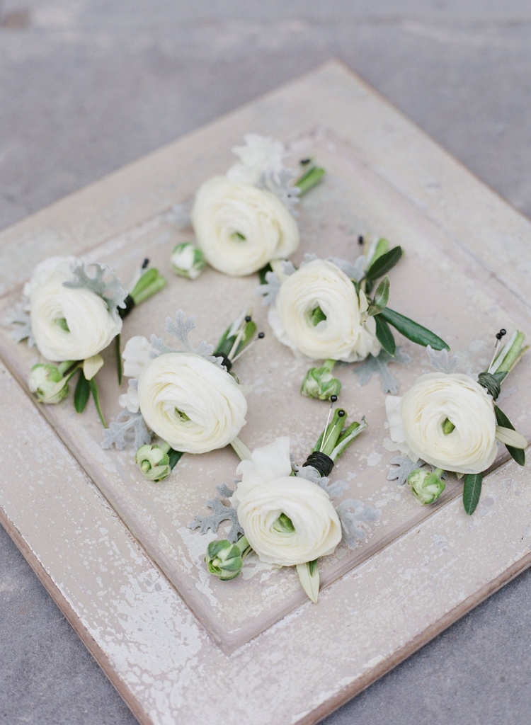 Photograph by Corbin Gurkin. Boutonieres by Blossoms Events.