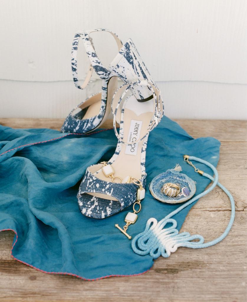 Jimmy Choo’s “Miranda” sandals from Gwynn’s of Mount Pleasant. Madame Magar’s coiled, hand-dyed indigo fabric ring dish and silk scarf, both from the Gibbes Museum of Art gift shop. Black opal and diamond gold ring from Gold Creations. David Yurman’s Helena  Collection gold dome ring from REEDS Jewelers. “Jane” toggle bracelet from Spartina 449. “Robin’s Egg” hand-dyed and hand-sewn indigo rope necklace from Kristy Bishop