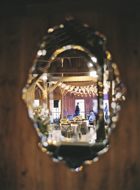 MIRROR BALL: Venetian-style cut-glass mirrors added polish to the rustic barn walls.