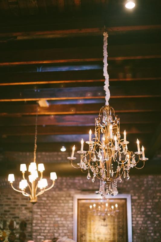 Lighting by Technical Event Company. Wedding design and coordination by Sage Innovations. Image by Juliet Elizabeth Photography at McCrady’s Restaurant.