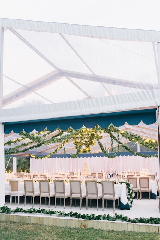 Kelly asked Tara to create a simple yet romantic setting with chandeliers and multi-sized tables.