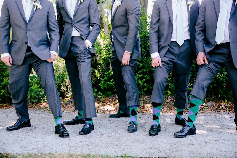 Groom + groomsmen attire by Calvin Klein through Men’s Wearhouse. Image by Dana Cubbage Weddings.