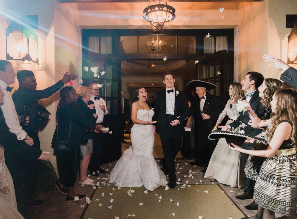 “There was so much love in the air,” Gaby says of the night. A few guests borrowed the Mariachi band’s sombreros when they lined up to shower the couple in orchids during their departure.  &lt;i&gt;Photograph by Corbin Gurkin&lt;/i&gt;