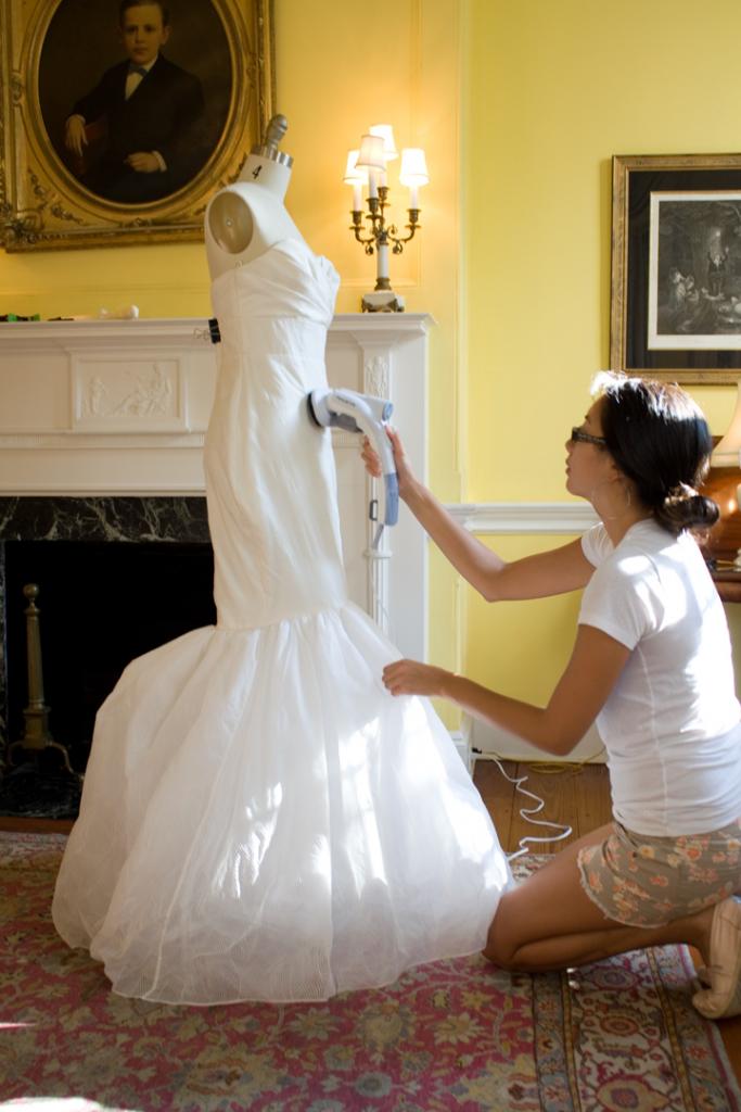 Kristy steams LulaKate’s “Novak” gown smooth. The cover of the 2008 Charleston Weddings was shot in this room