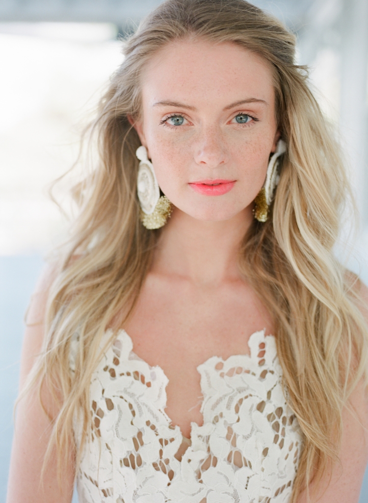 Blush by Hayley Paige’s “Halo” gown from Bridals by Jodi. Olivia Dar’s earrings from Celadon