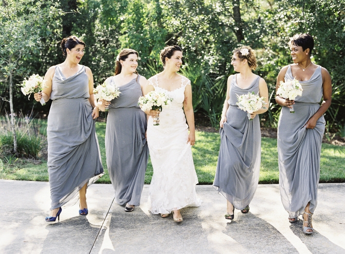 LOVELY LADIES: Bridesmaids wore Dessy gowns in charcoal gray.