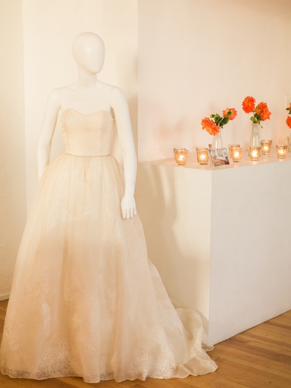 As the evening took on a glow, the blush hue of this Kate McDonald gown grew warmer.