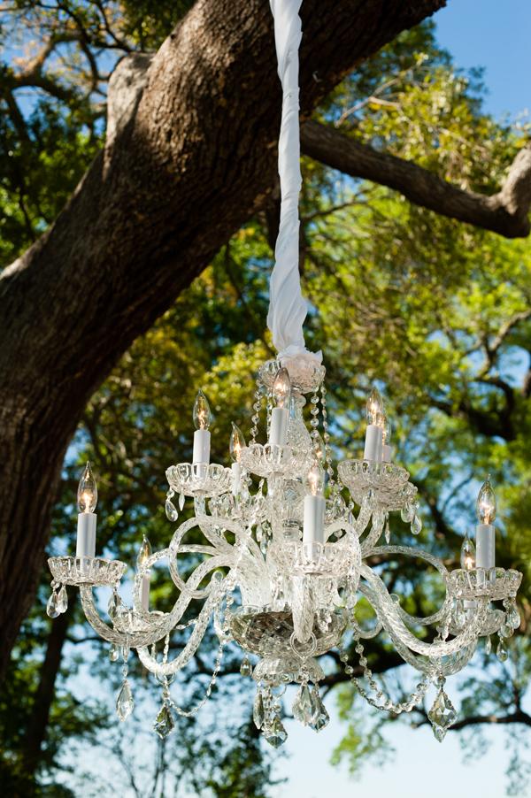 A LOOK ABOVE: Twisted white fabric fancied up light fixtures outdoors. “It all looked very elegant,” says Anna.