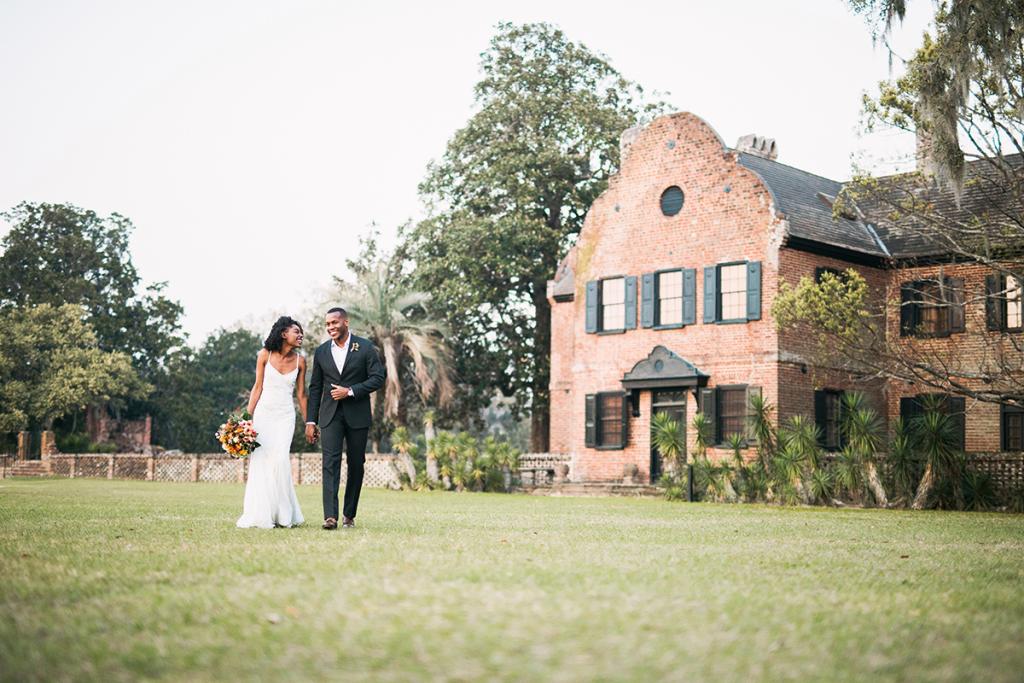 Real-life couple Venita Aspen and Alex Saunders exude chemistry, not to mention style. Their understated looks—her sheath gown and his open-collar shirt and suit—epitomize the easy elegance of smaller weddings at staid locations.
