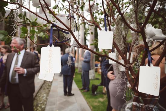 CREATIVE THINKING: Guest plucked their escort cards from the branches of Manzanita trees.